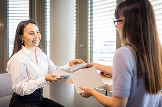 A young professional works at her desk.
