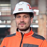 A portrait of Benedikt Zeisner on the construction site.